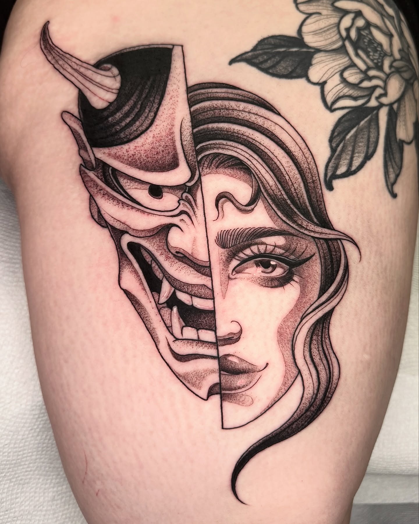Demon and woman realism tattoo on the thigh by Las Vegas Tattoo Artist
