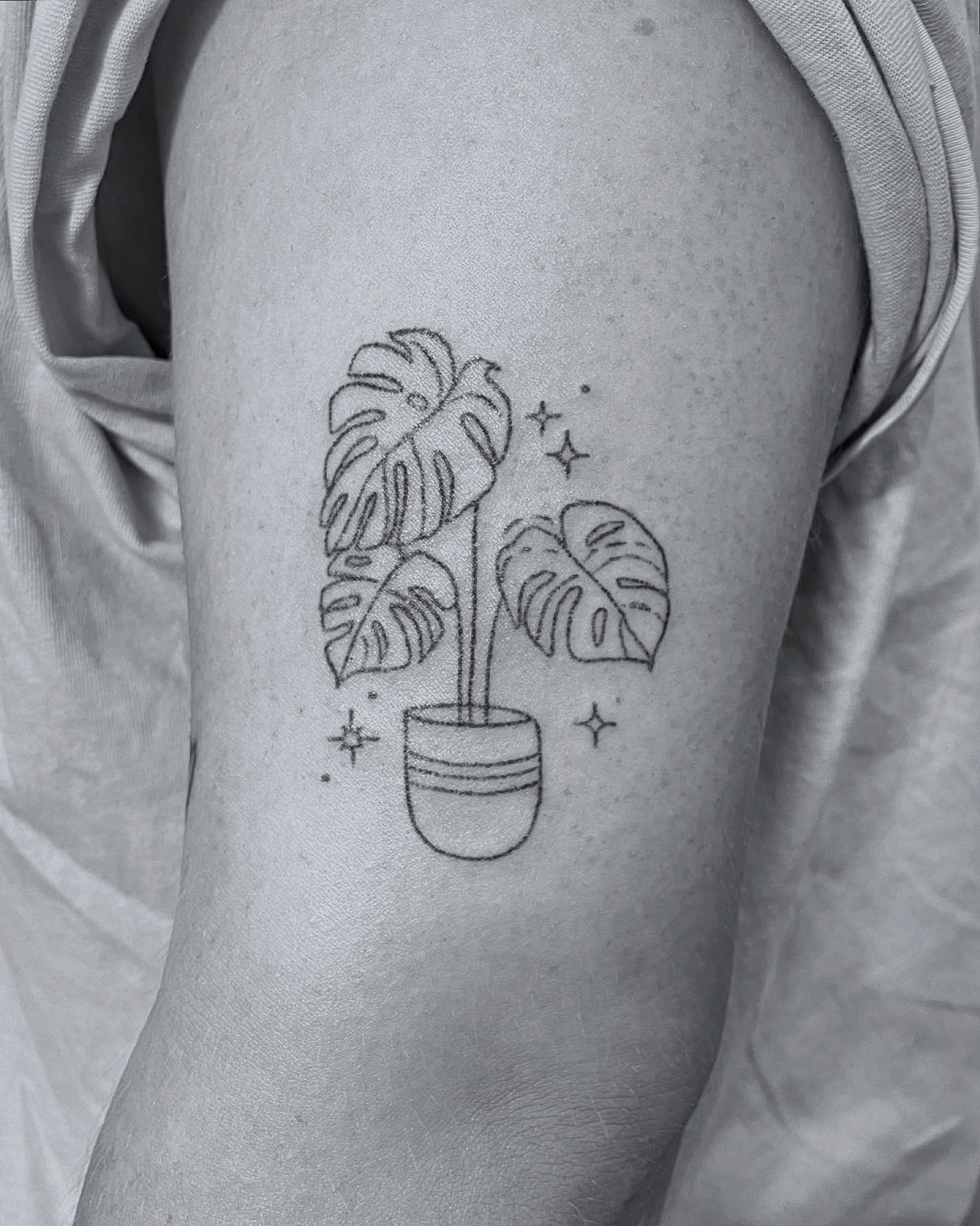 Tattoo by @titsfortatt — minimalist, black_and_grey