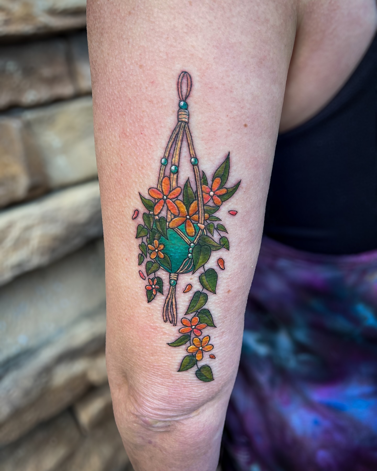 Macrame plant hanger new school tattoo on the forearm by Reagan Sutton