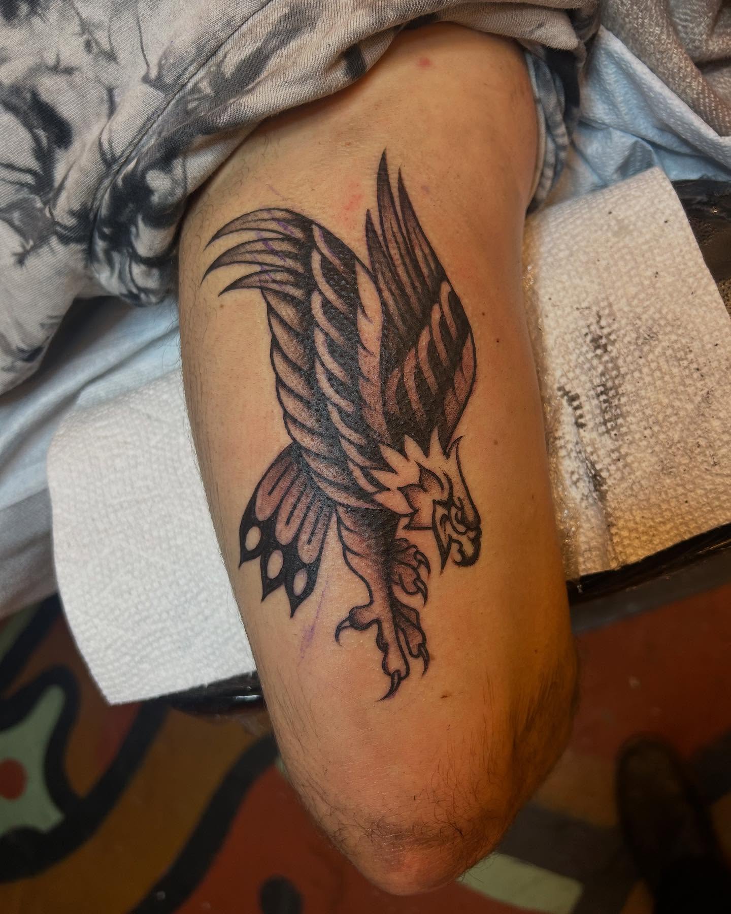 Eagle black and grey tattoo on the thigh by Sam Perry, Denver, Colorado