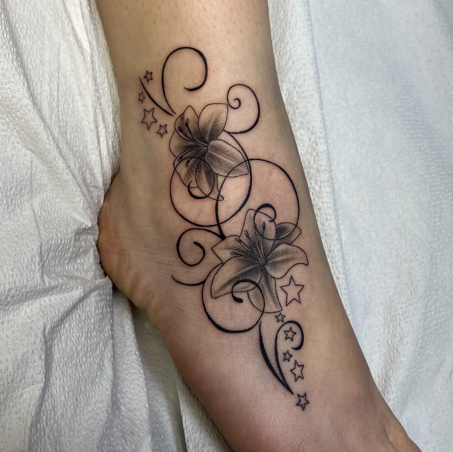Flowers and swirls black and grey tattoo on the forearm by Ana Valadez π¦, Ventura, California