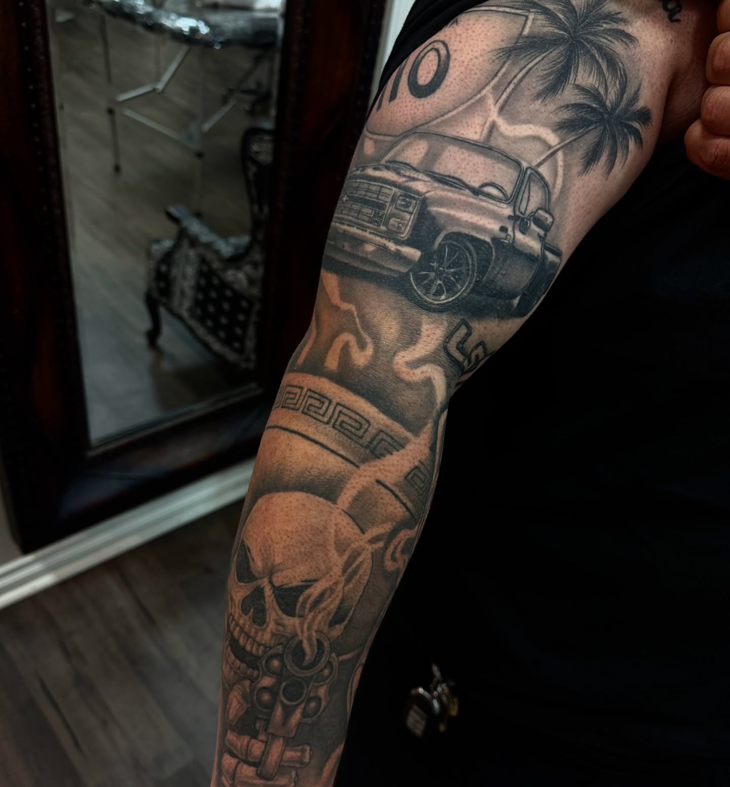 Car and skull realism tattoo on the forearm by Jonathan Solis 🇲🇽🇺🇸