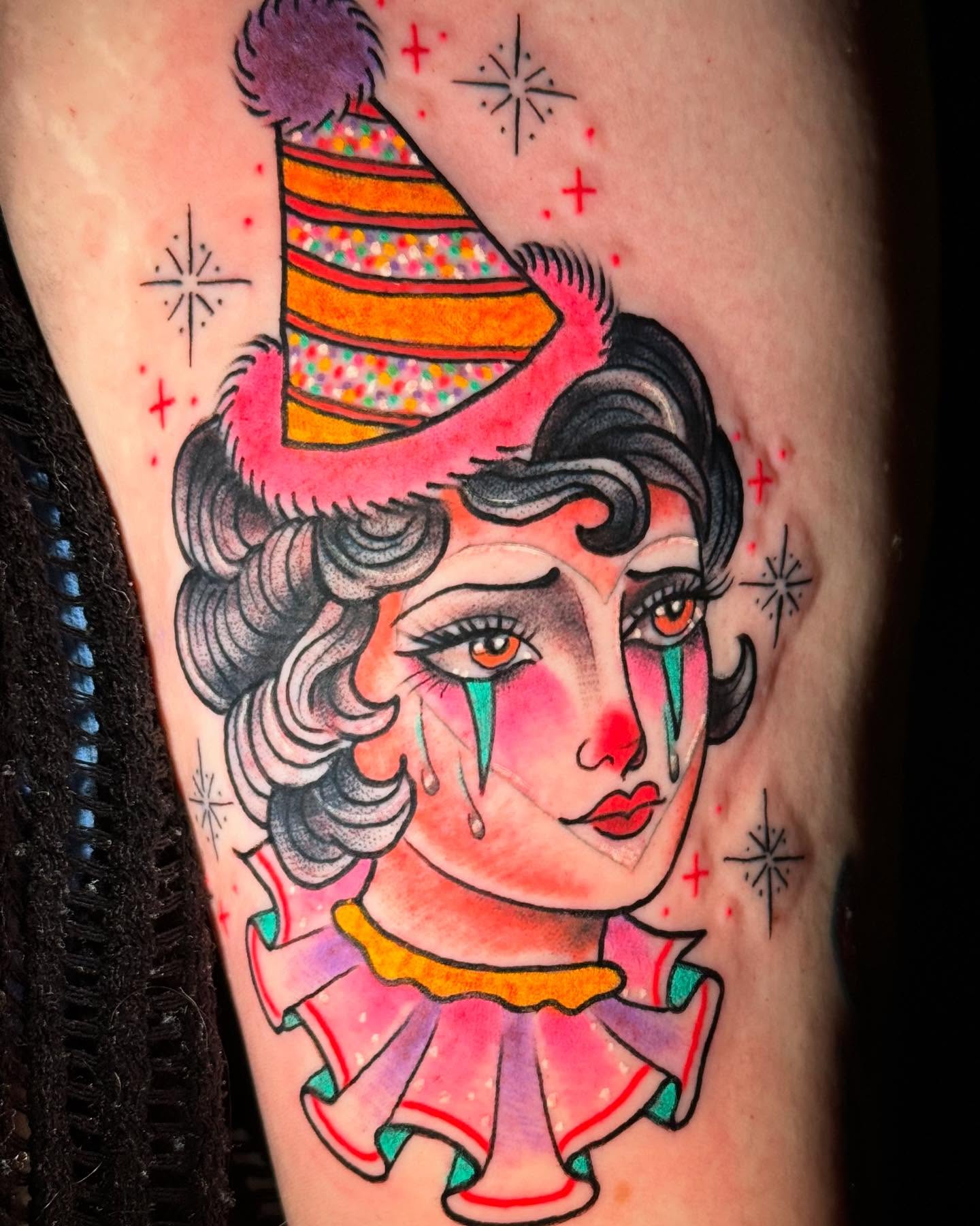 Clown American traditional tattoo on the forearm by Chelsea Lane