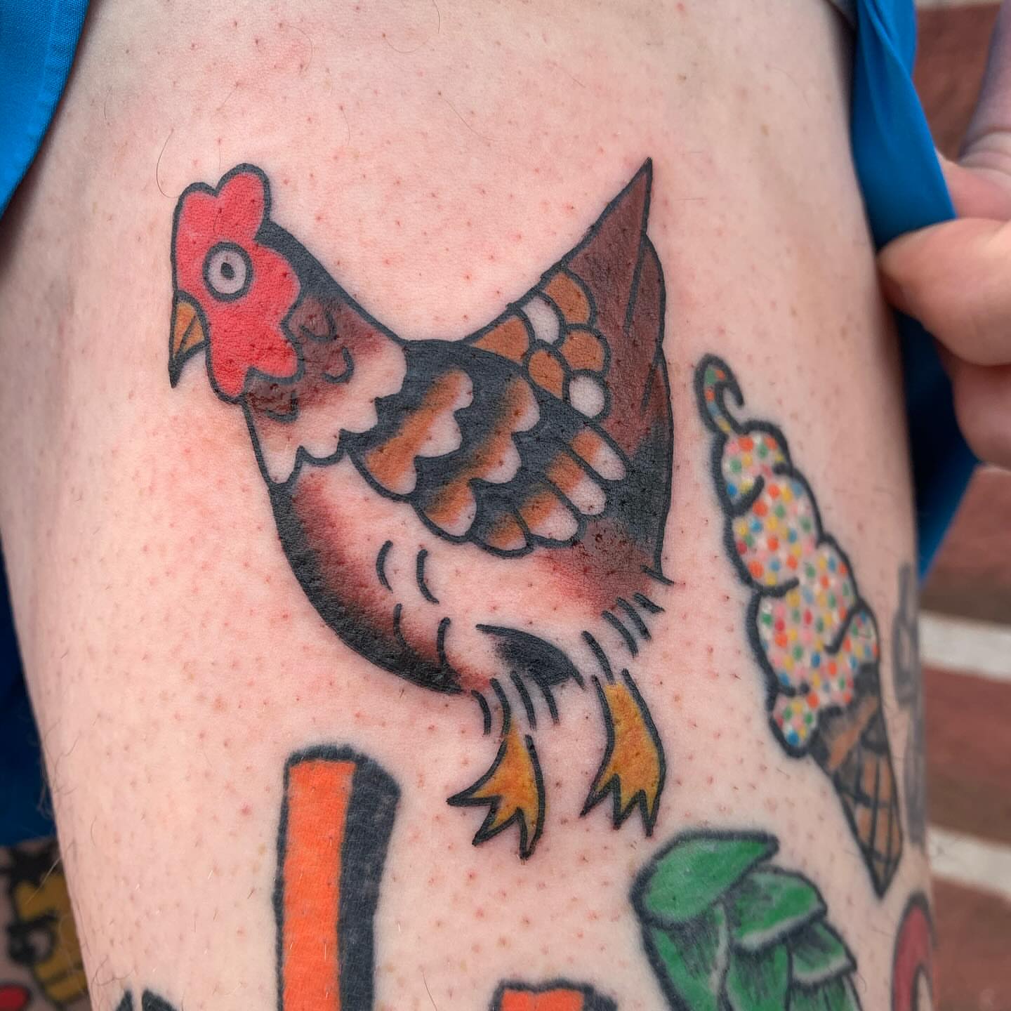 Rooster American traditional tattoo on the thigh by ellie