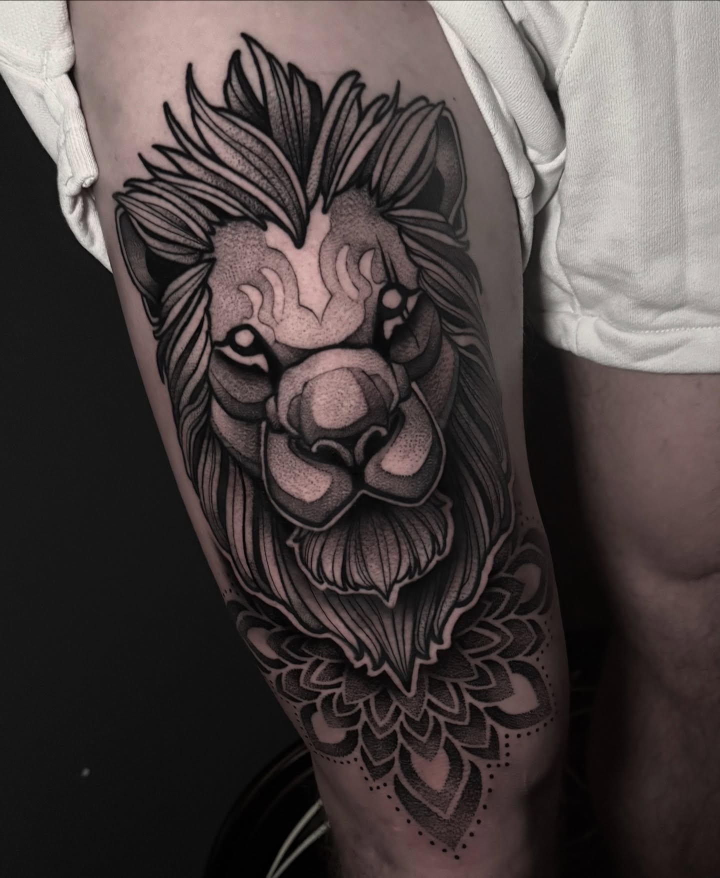 Lion dotwork tattoo on the forearm by Clayton Smith (BEAR)