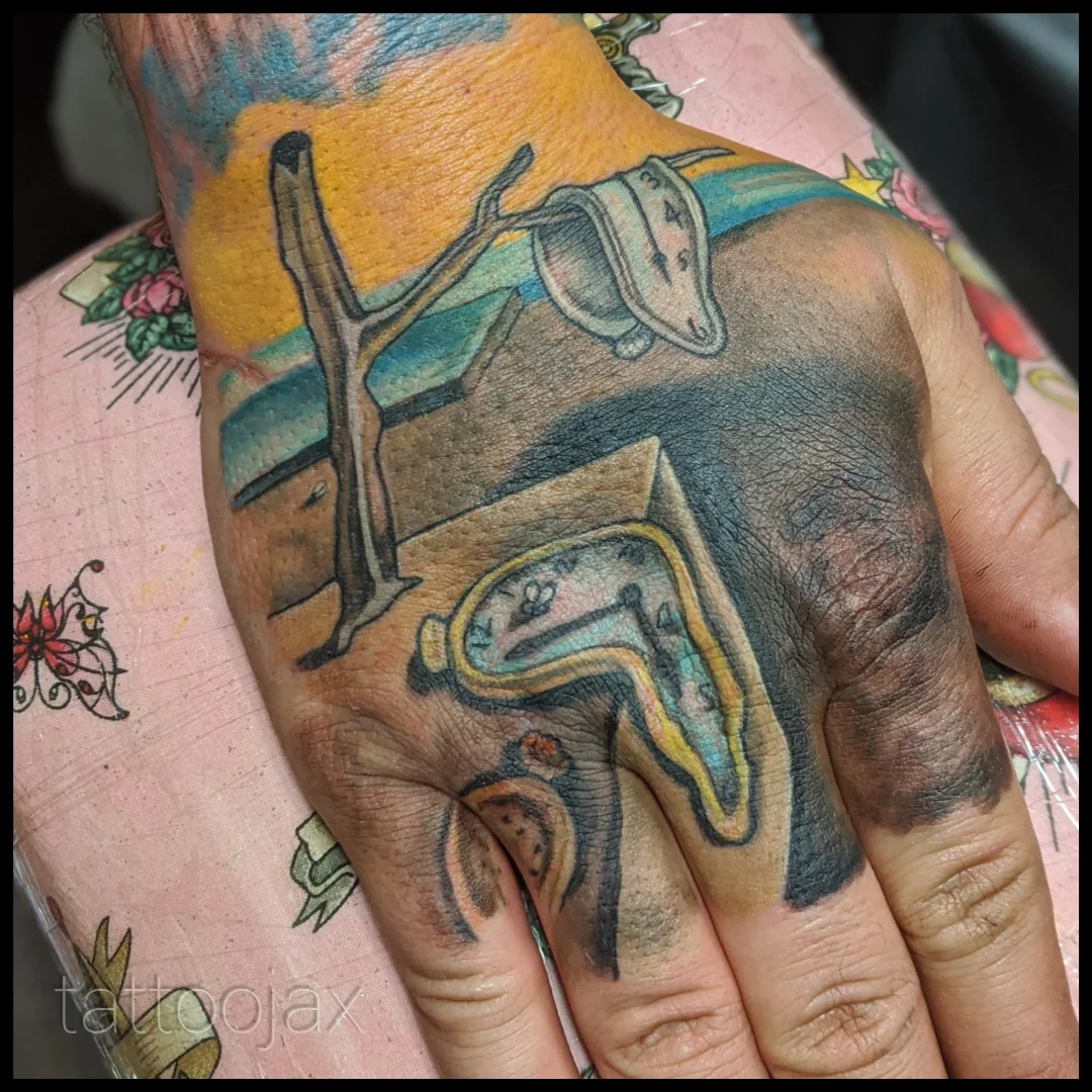 Cow and sunset American traditional tattoo on the hand by jackie