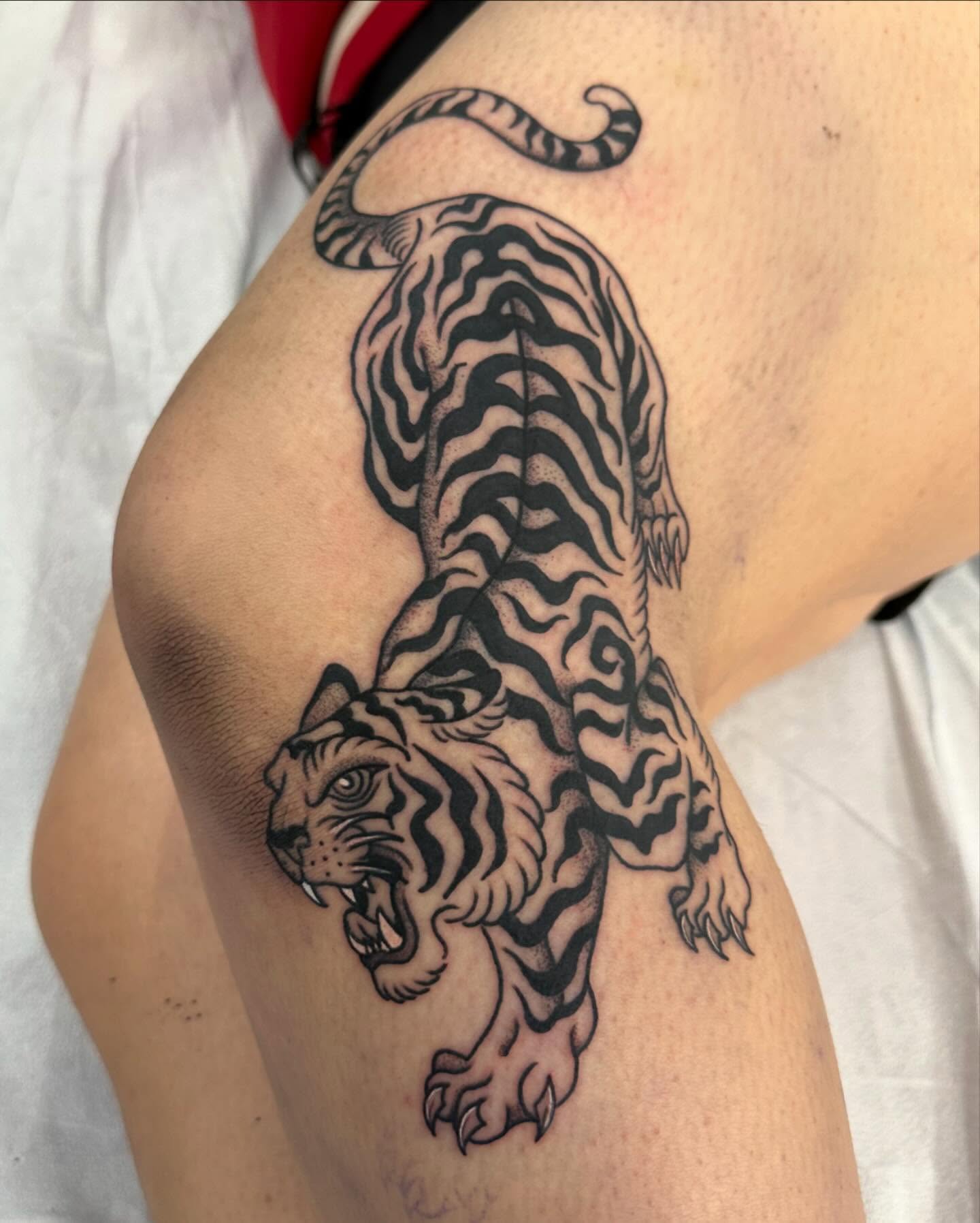 Tiger black and grey tattoo on the upper arm by Sierra Hiddleson- Phoenix Arizona Tattoo