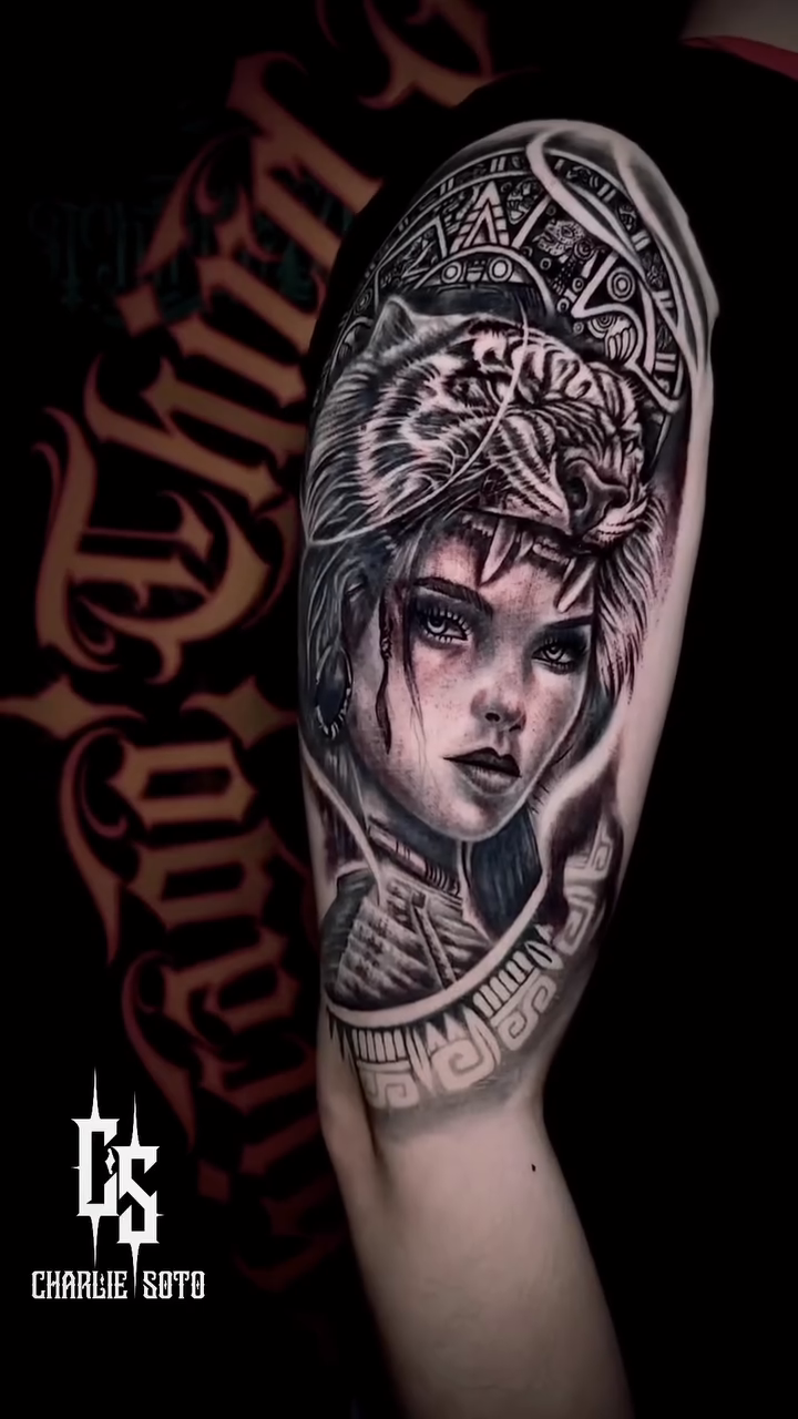 Woman with tiger headdress realism tattoo by Charlie Soto