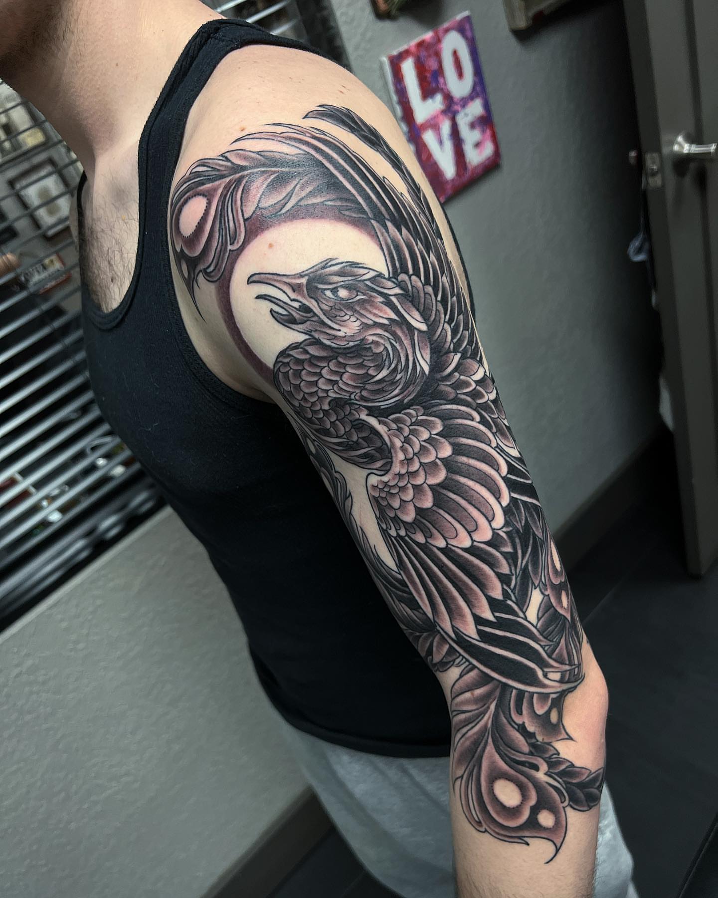 Peacock japanese irezumi tattoo on the upper arm by Byron Winkelman, Gilbert, Arizona