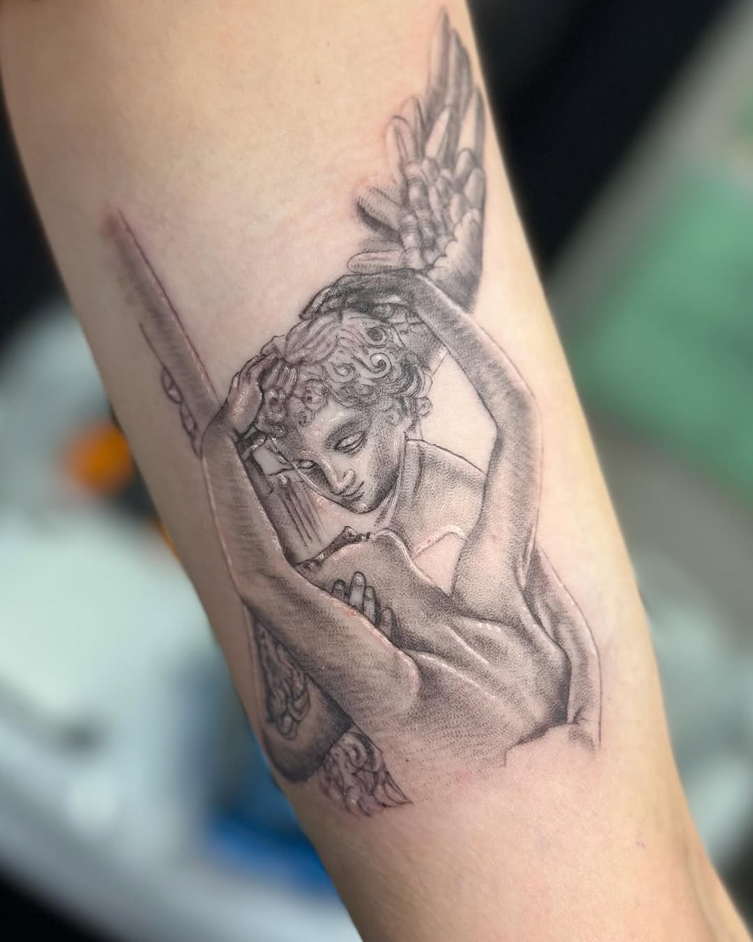 Cupid and Psyche statue realism tattoo on the forearm by Michaelle Fiore ππ½πΈπ¨ π