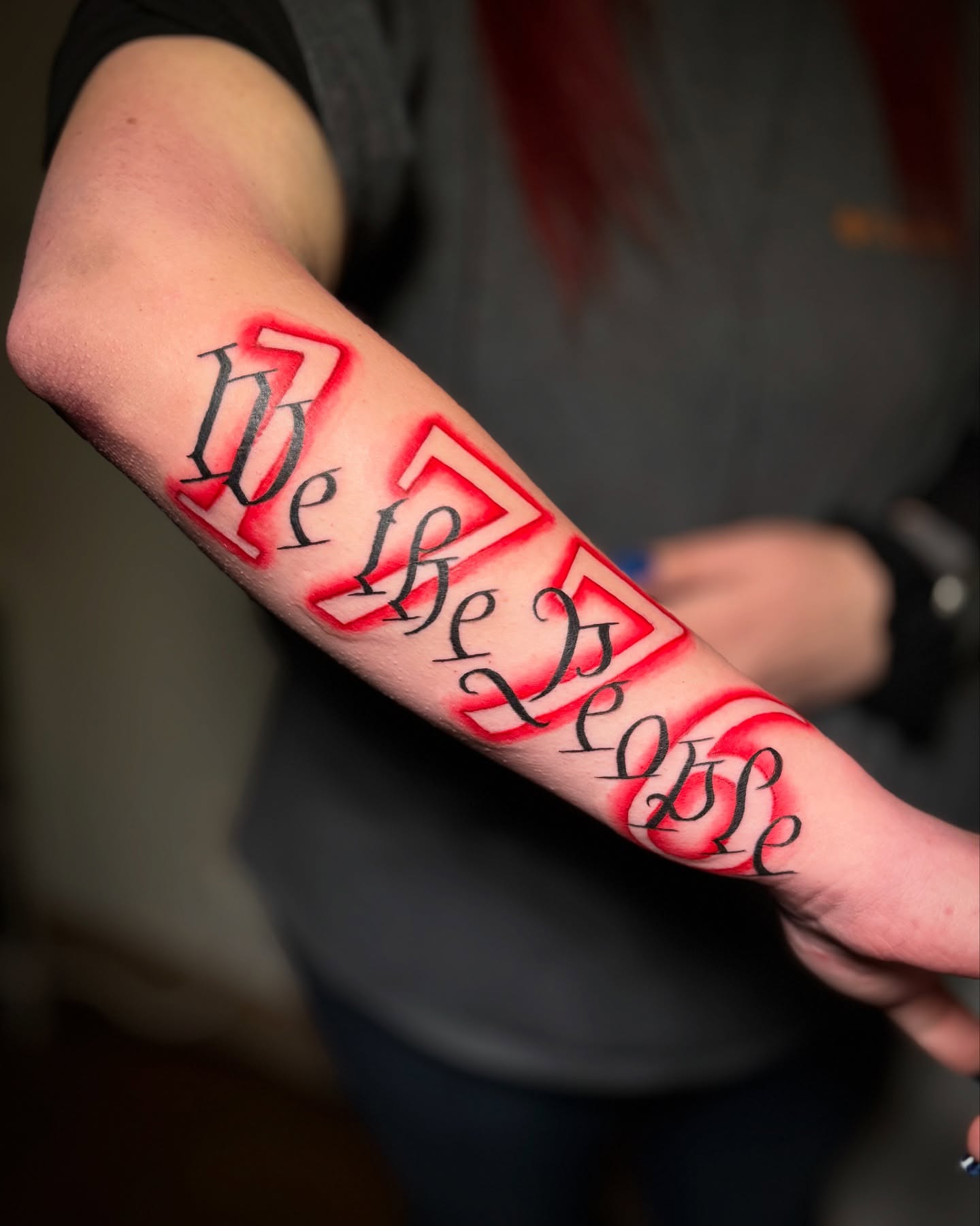 We the People lettering script tattoo on the forearm by Jewels, St. George, Utah