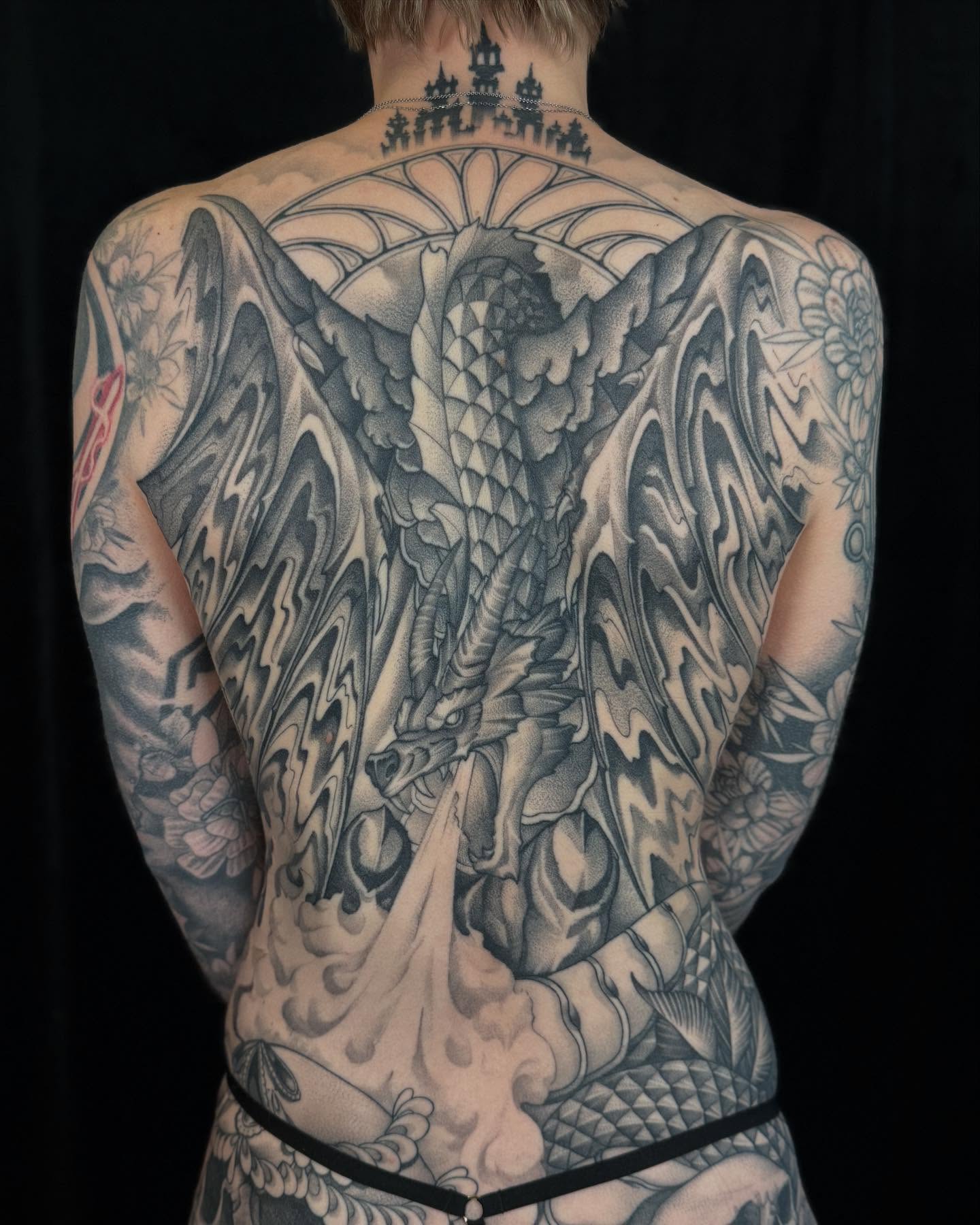 Dragon geometric tattoo on the back by Will Campbell