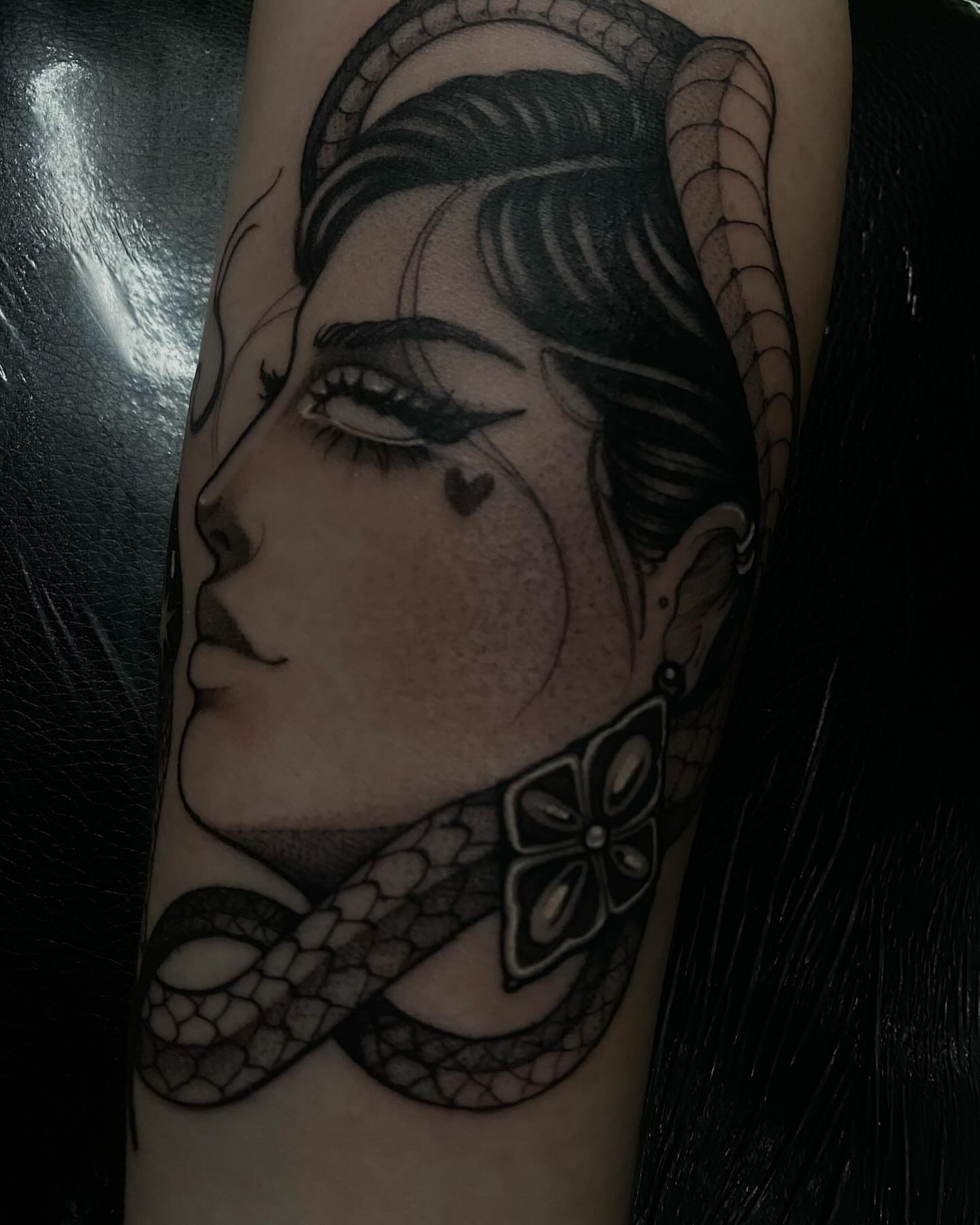 Woman's profile realism tattoo on the forearm by 𝔗𝔞𝔶𝔩𝔬𝔯 𝔈𝔩𝔦𝔷𝔞𝔟𝔢𝔱𝔥, Tulsa, Oklahoma
