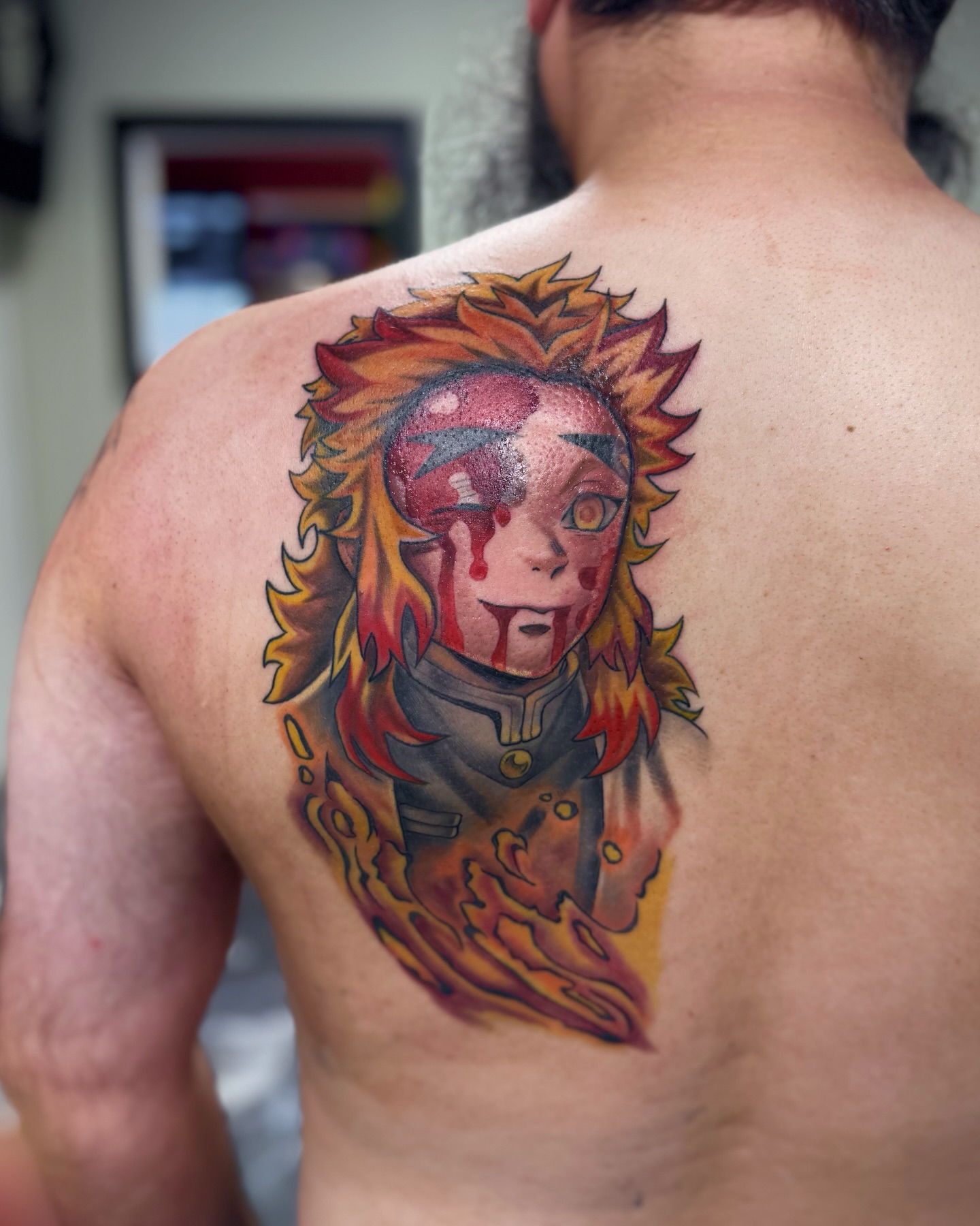 Flame girl anime tattoo on the back by Suda