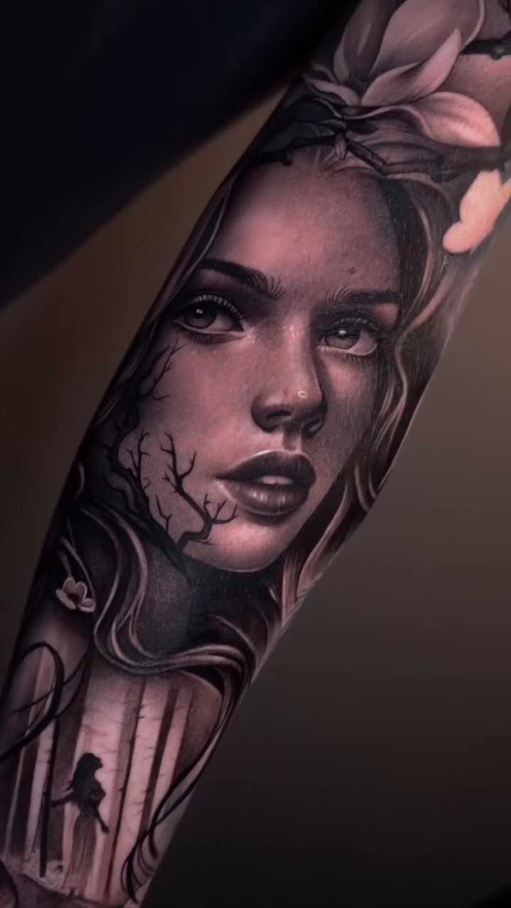 Woman with flowers and trees realism tattoo by Risa