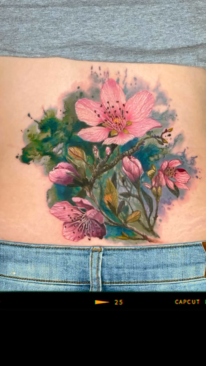 Floral arrangement watercolor tattoo by Brian Ulibarri
