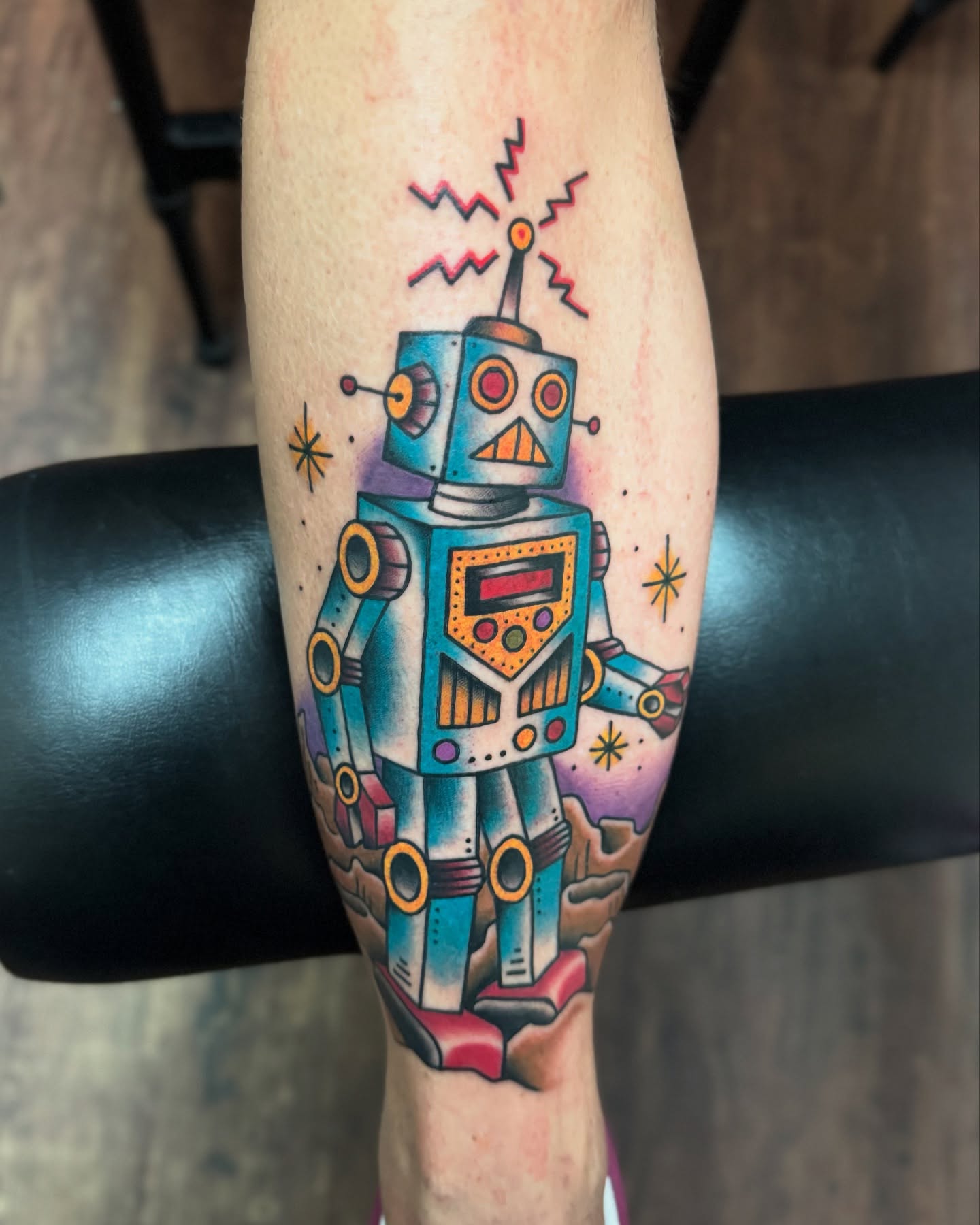Robot American traditional tattoo on the forearm by Casket
