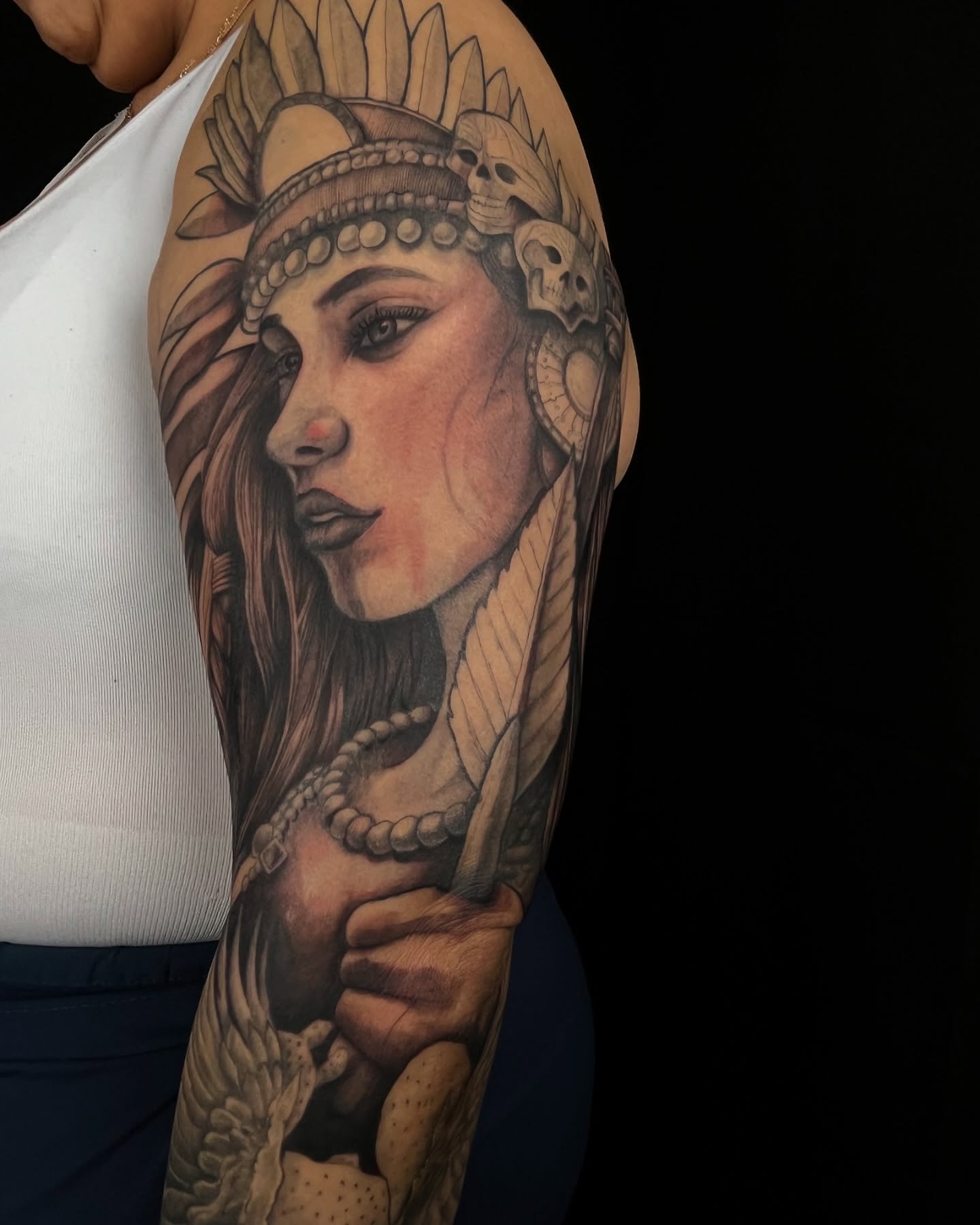 Indian woman realism tattoo on the upper arm by Denver Tattoo Artist