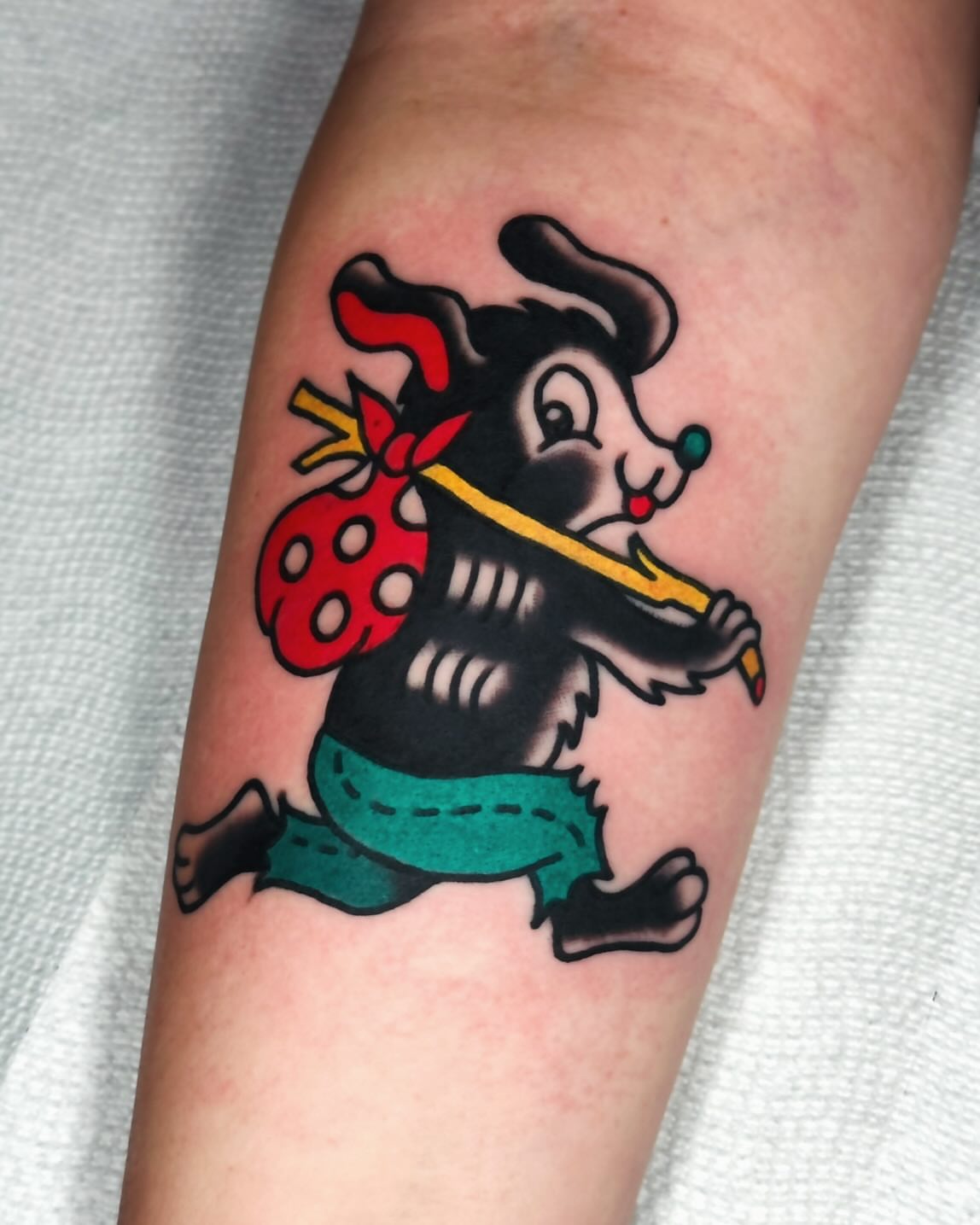 Chipmunk playing recorder American traditional tattoo on the forearm by Steve Pearson