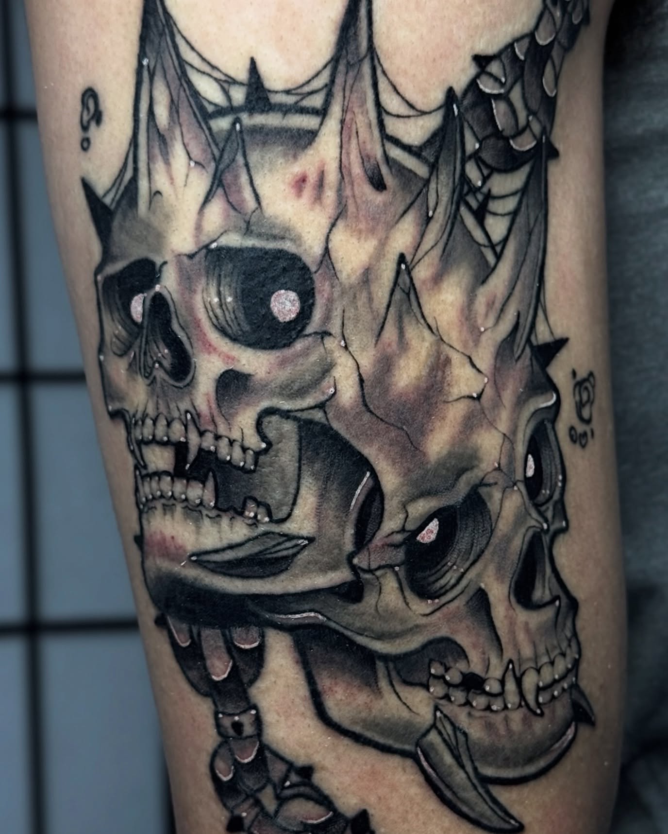 Skulls dark realism tattoo on the forearm by Taylin Johnson- Illustrative Blackwork, Columbus, Ohio