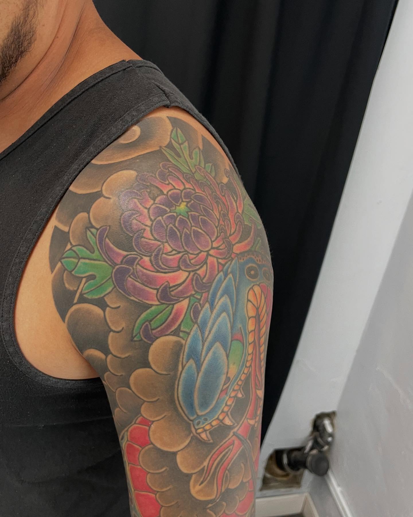 Peony and snake japanese irezumi tattoo on the shoulder by Ei Horimiya Omiya