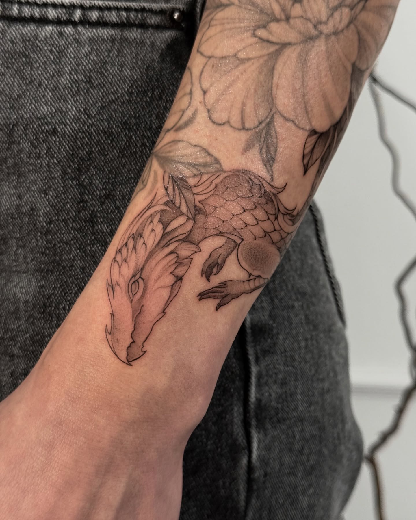 Phoenix black and grey tattoo on the forearm by Anastasiia Pakhanova ♥ tattoo artist