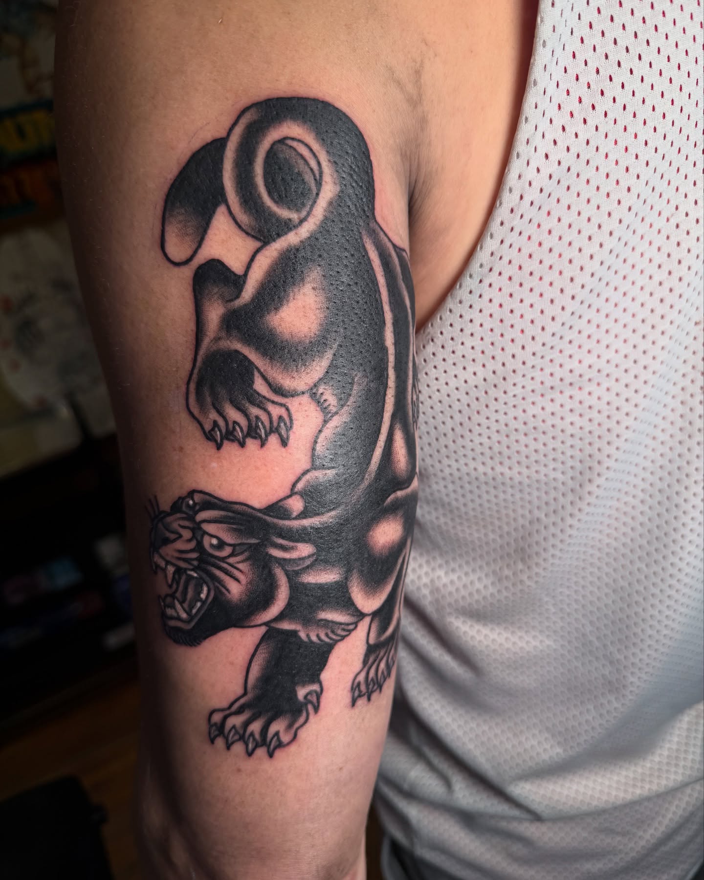 Panther black and grey tattoo on the forearm by πππ’π―π’π¨ πππΆπ©π¬π―π, Manchester, New Hampshire