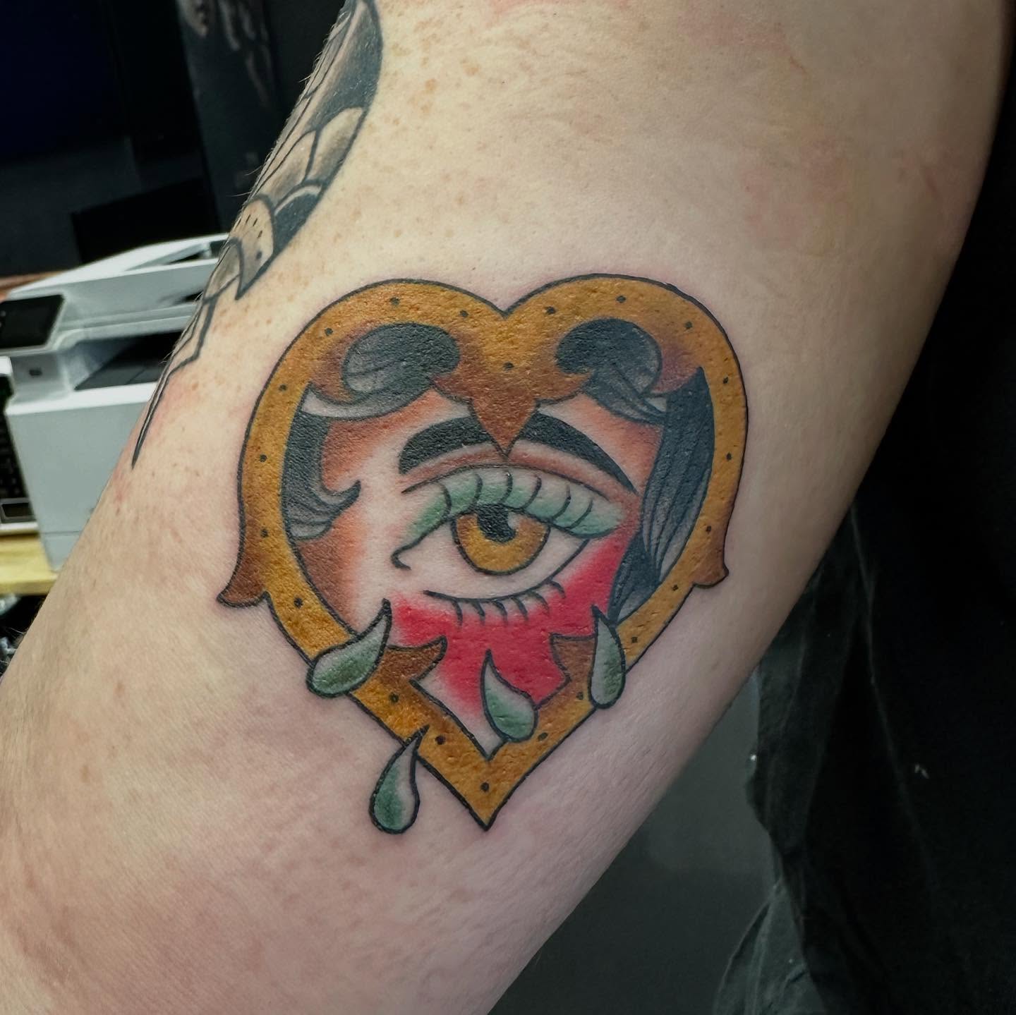Eye within heart American traditional tattoo on the forearm by Brendan Willbern, Austin, Texas