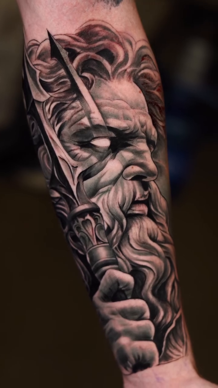 Zeus with trident realism tattoo by Luis Arenas