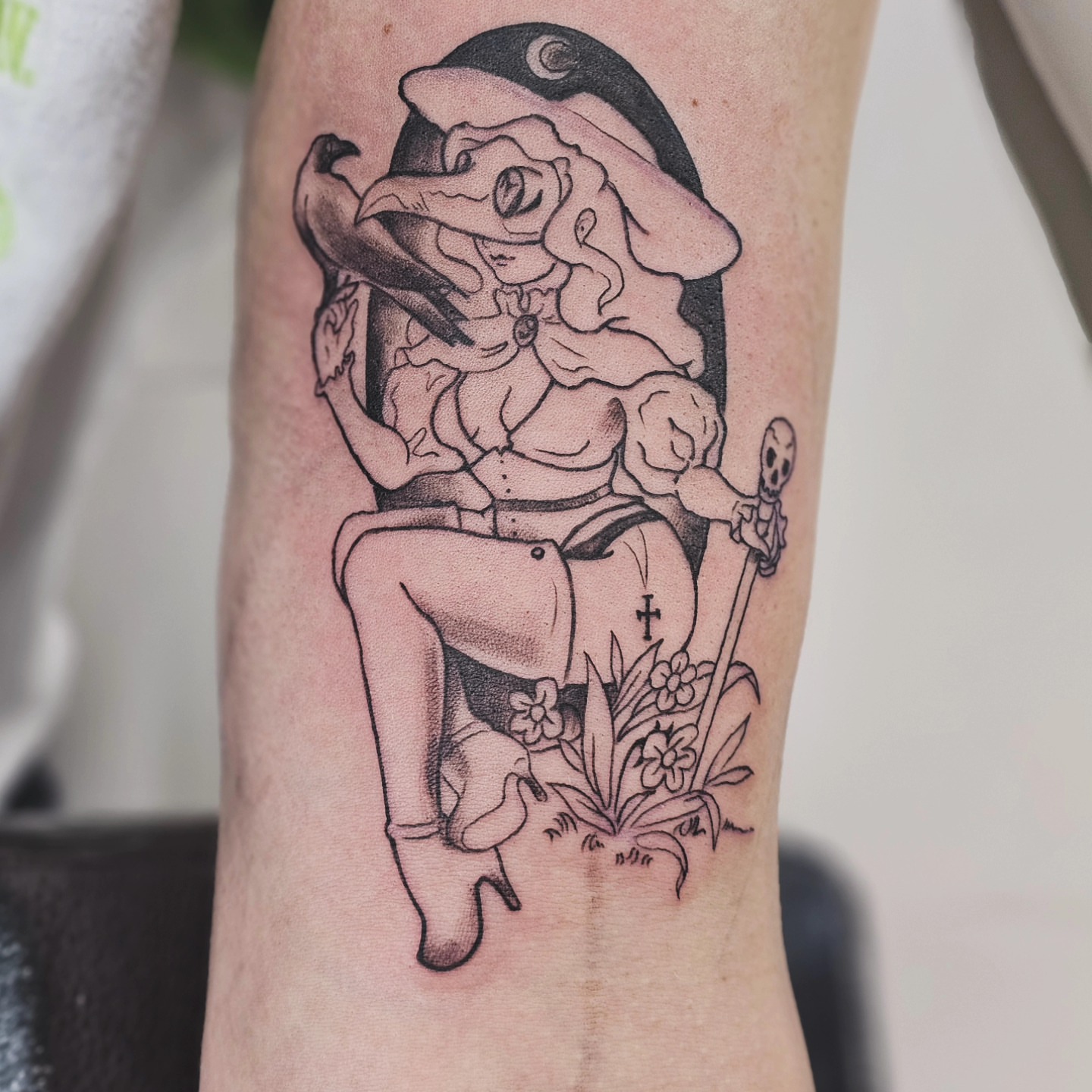 Woman with bird black and grey tattoo on the forearm by Nadine ☥