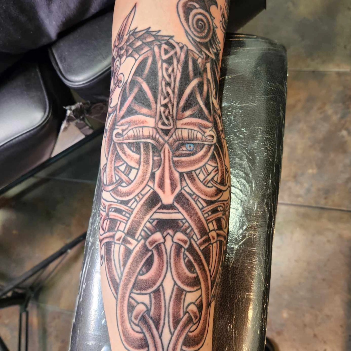 Viking helmet black and grey tattoo on the forearm by Samantha Von Zombia, Saint Paul, Minnesota