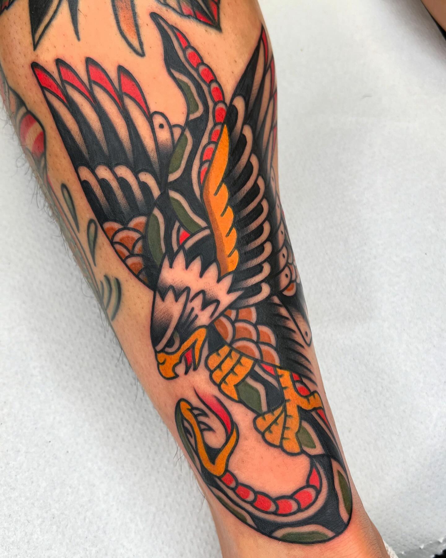 Eagle American traditional tattoo on the forearm by Arturo Ledesma