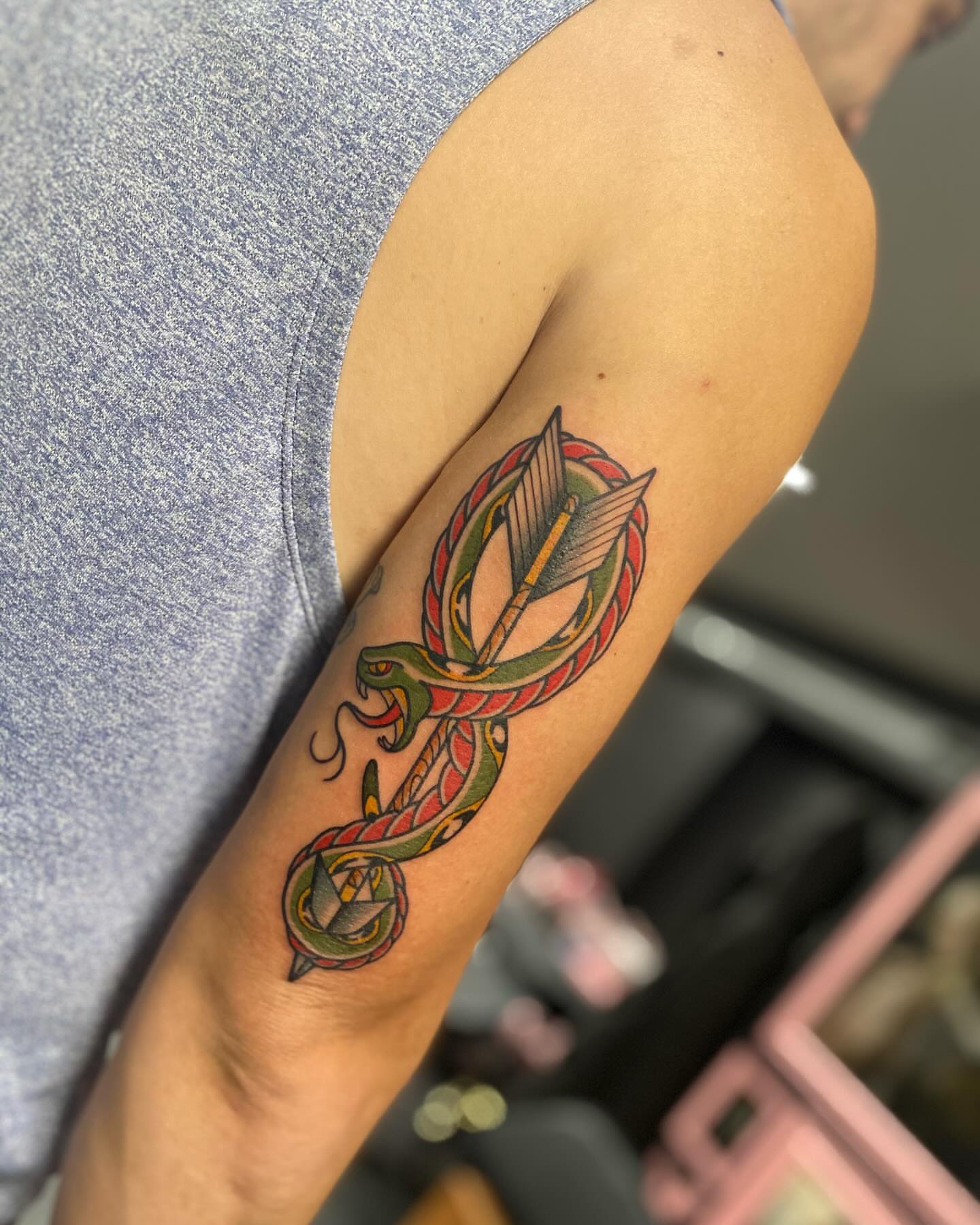 Snake and arrow American traditional tattoo on the forearm by S C O T T