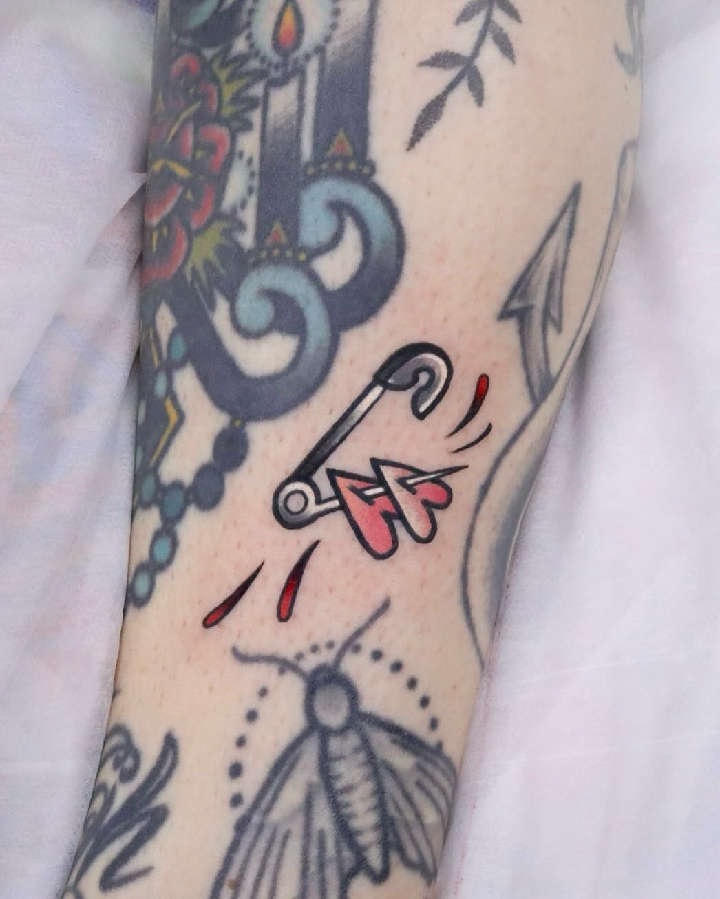 Anchor and heart American traditional tattoo on the forearm by 부산타투