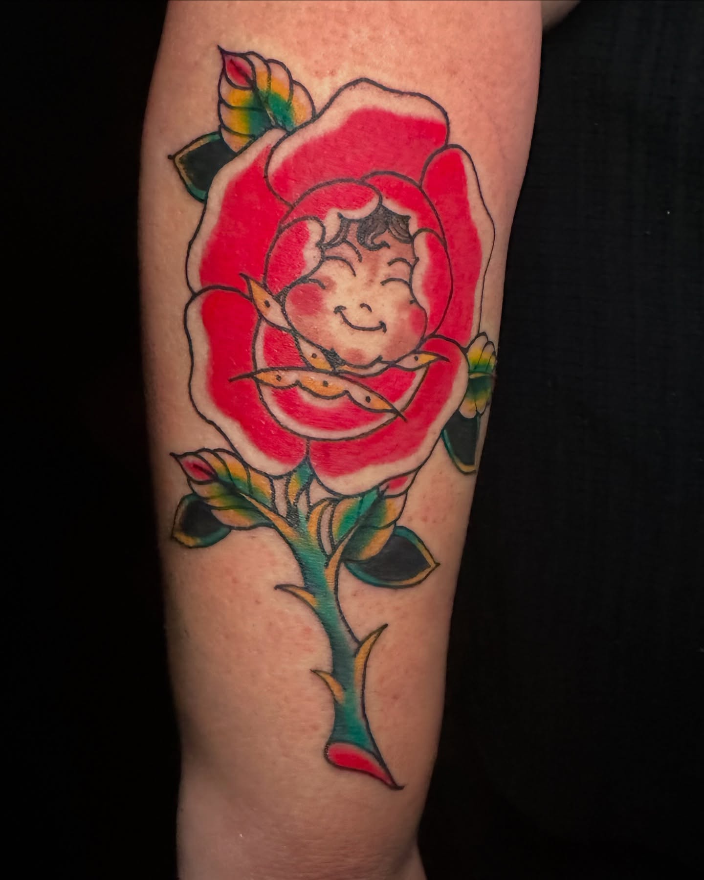 Rose with fairy American traditional tattoo on the forearm by vannadoestattoos