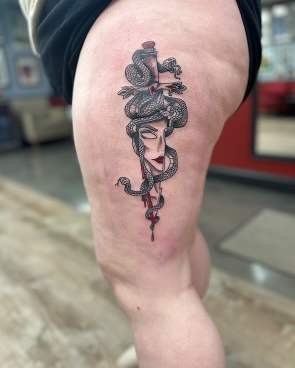 Woman with snake American traditional tattoo on the thigh by Ricardo (RJ)