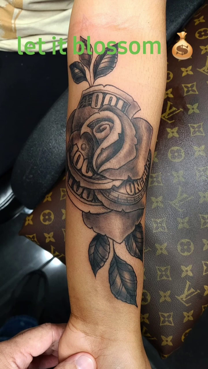 Rose and leaves realism tattoo by Germaine Sherman