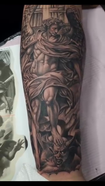 Angel and demons on a forearm realism tattoo on the forearm by Mac Obaob