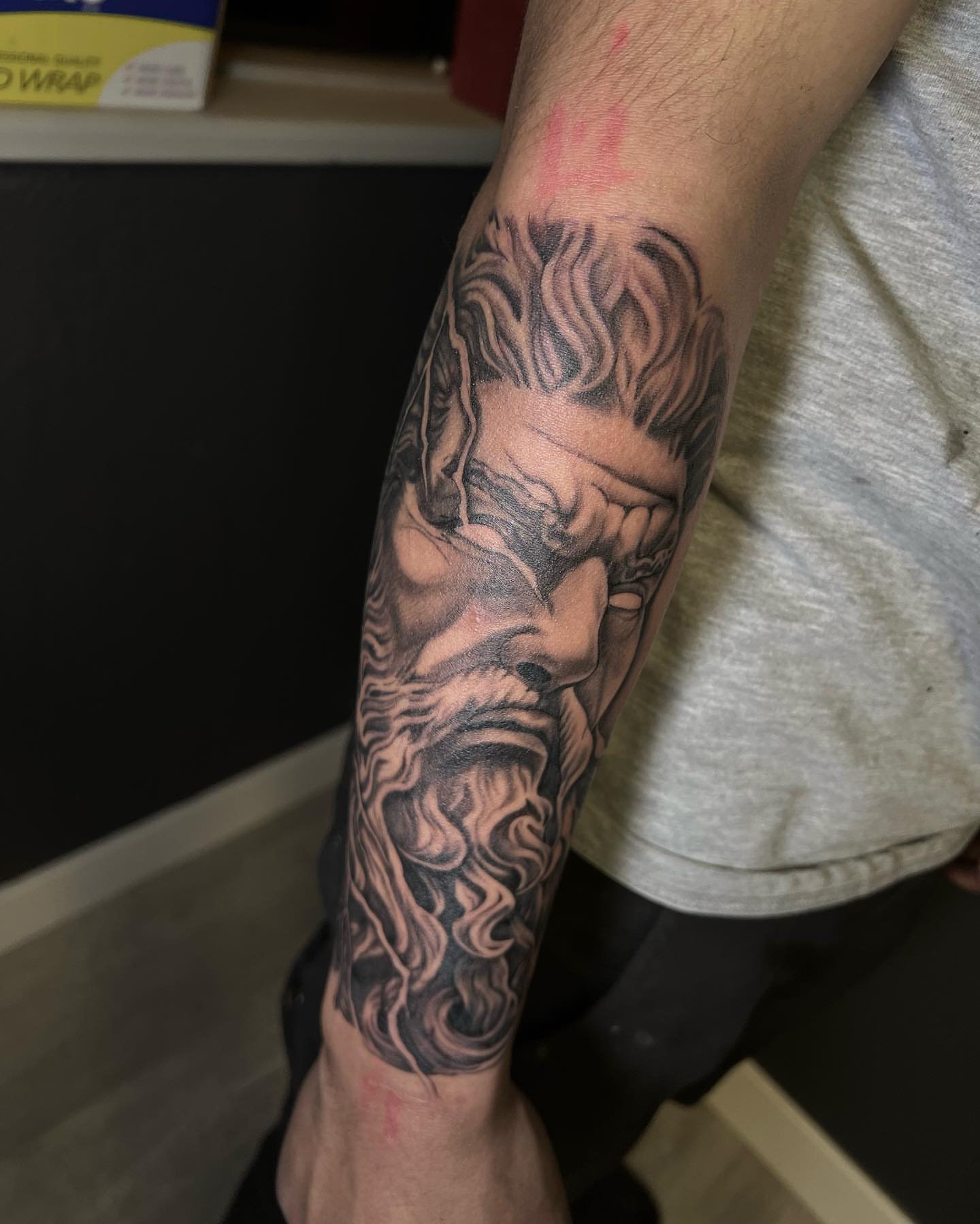 Bearded man realism tattoo on the forearm by Hugo Ruiz-Esparza