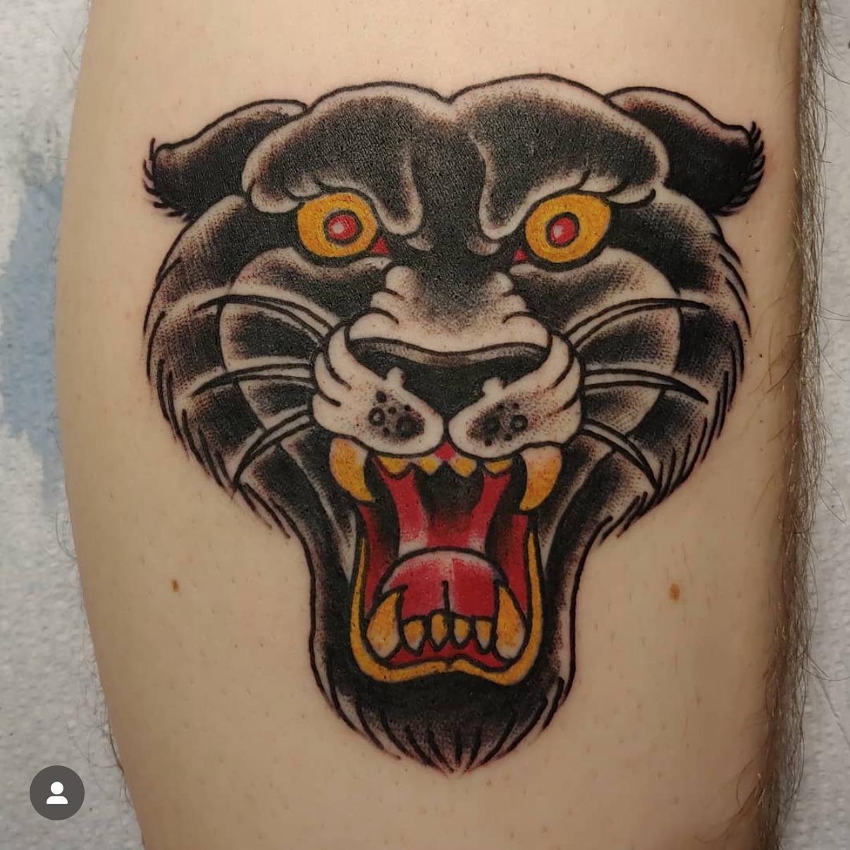 Panther head American traditional tattoo on the forearm by Mark Harada, Hoboken, New Jersey