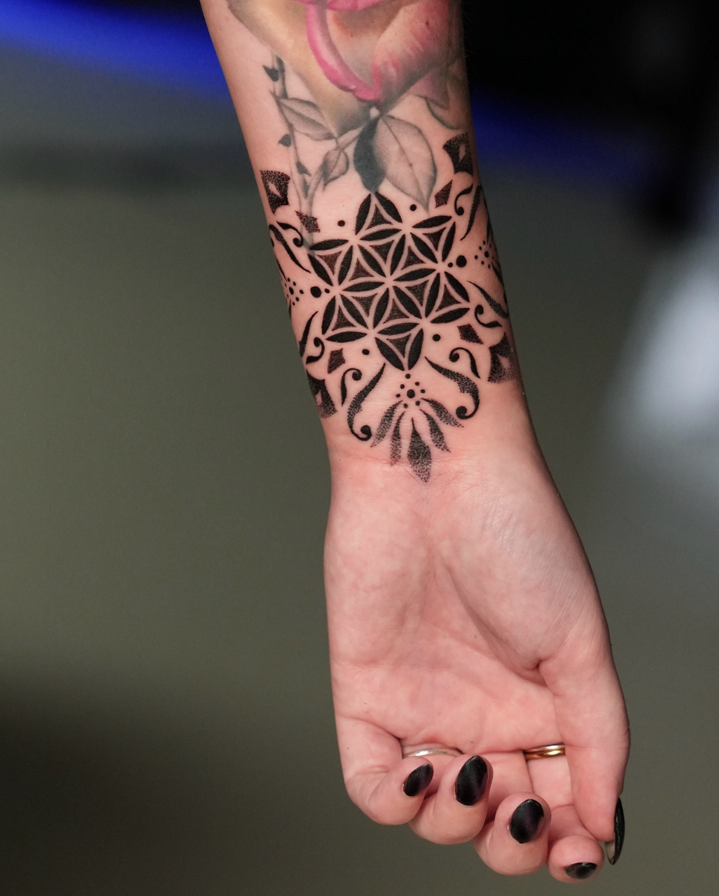 Geometric mandala dotwork tattoo on the forearm by ⓝⓐⓘⓡⓐⓓⓞⓣⓢ