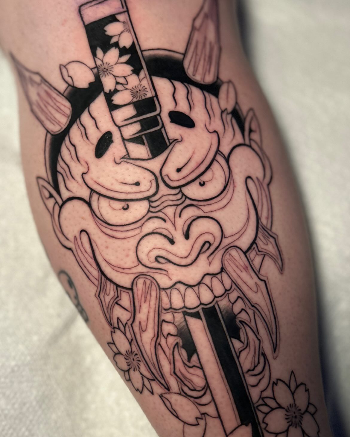 Mask with swords japanese irezumi tattoo on the forearm by Rat Girl, Dayton, Ohio
