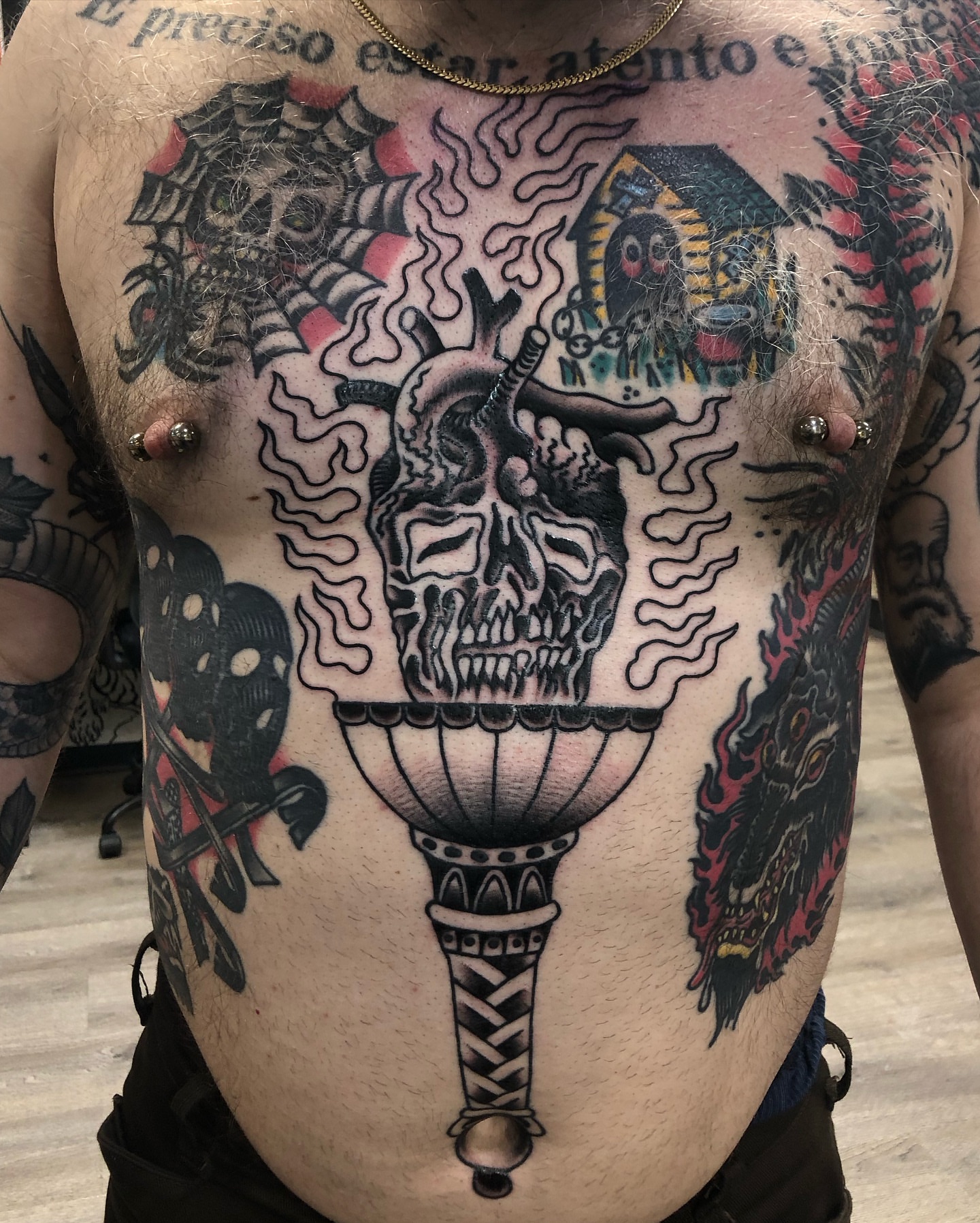 Skull in lamp American traditional tattoo on the chest by Nick Sharratt, Chicago, Illinois