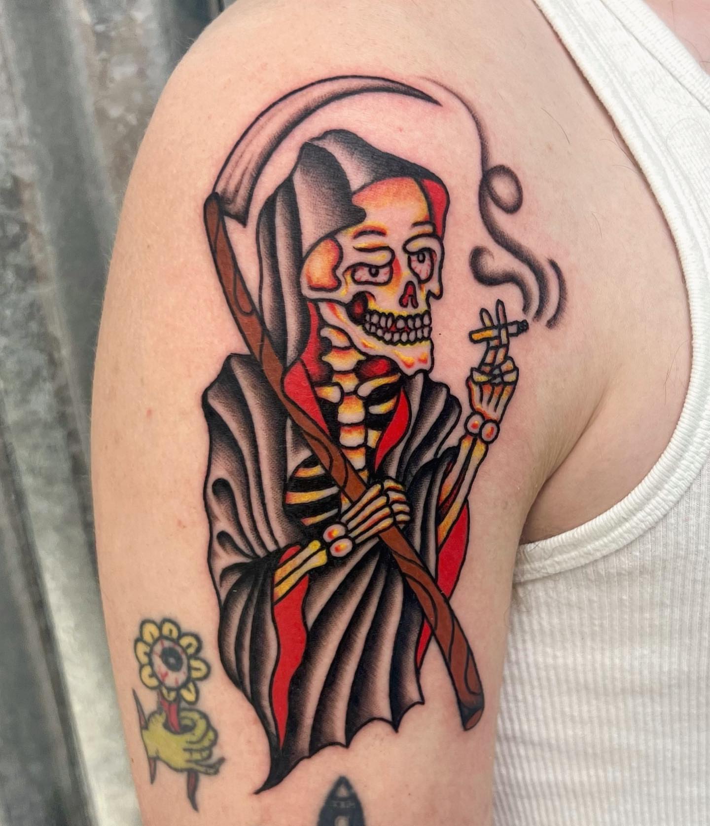 Reaper smoking American traditional tattoo on the shoulder by Carson Smith, Chandler, Arizona