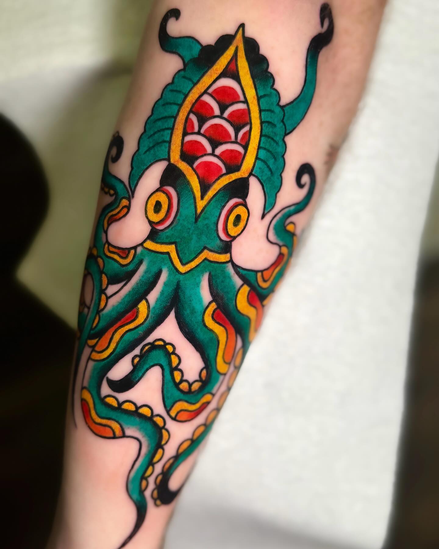 Octopus American traditional tattoo on the forearm by 🌸Elena Scott🌵Ohio Tattoo Artist