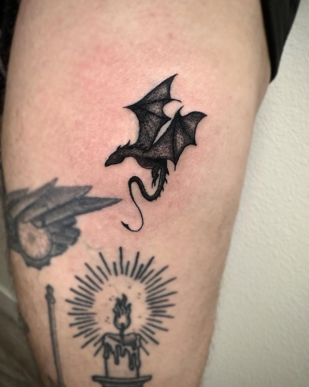 Dragon blackwork tattoo on the thigh by Tattoo Artist ⚔️ San Diego, CA