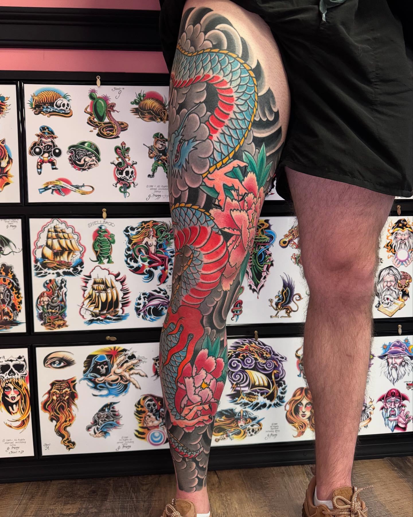 Dragon and peony japanese irezumi tattoo on the thigh by Landon Lewis