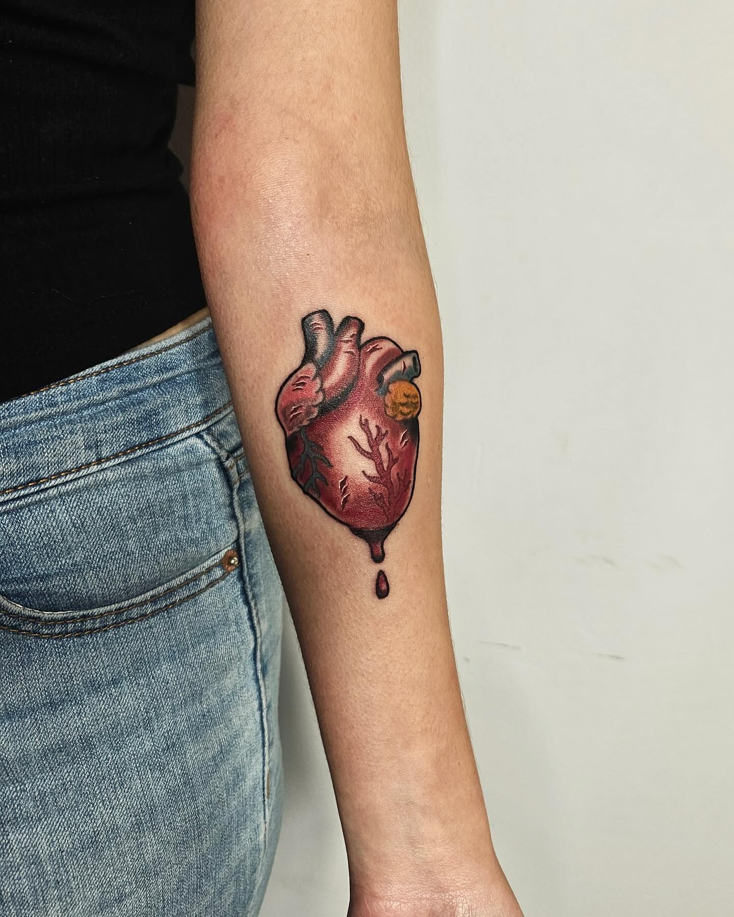 Heart realism tattoo on the forearm by J. Arturo Laparra