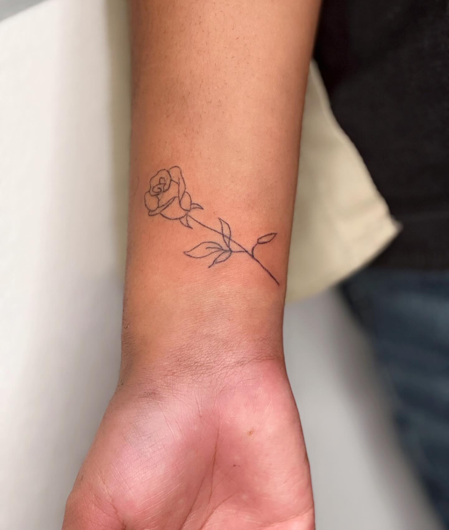 Rose fine line tattoo on the forearm by Juliette :D