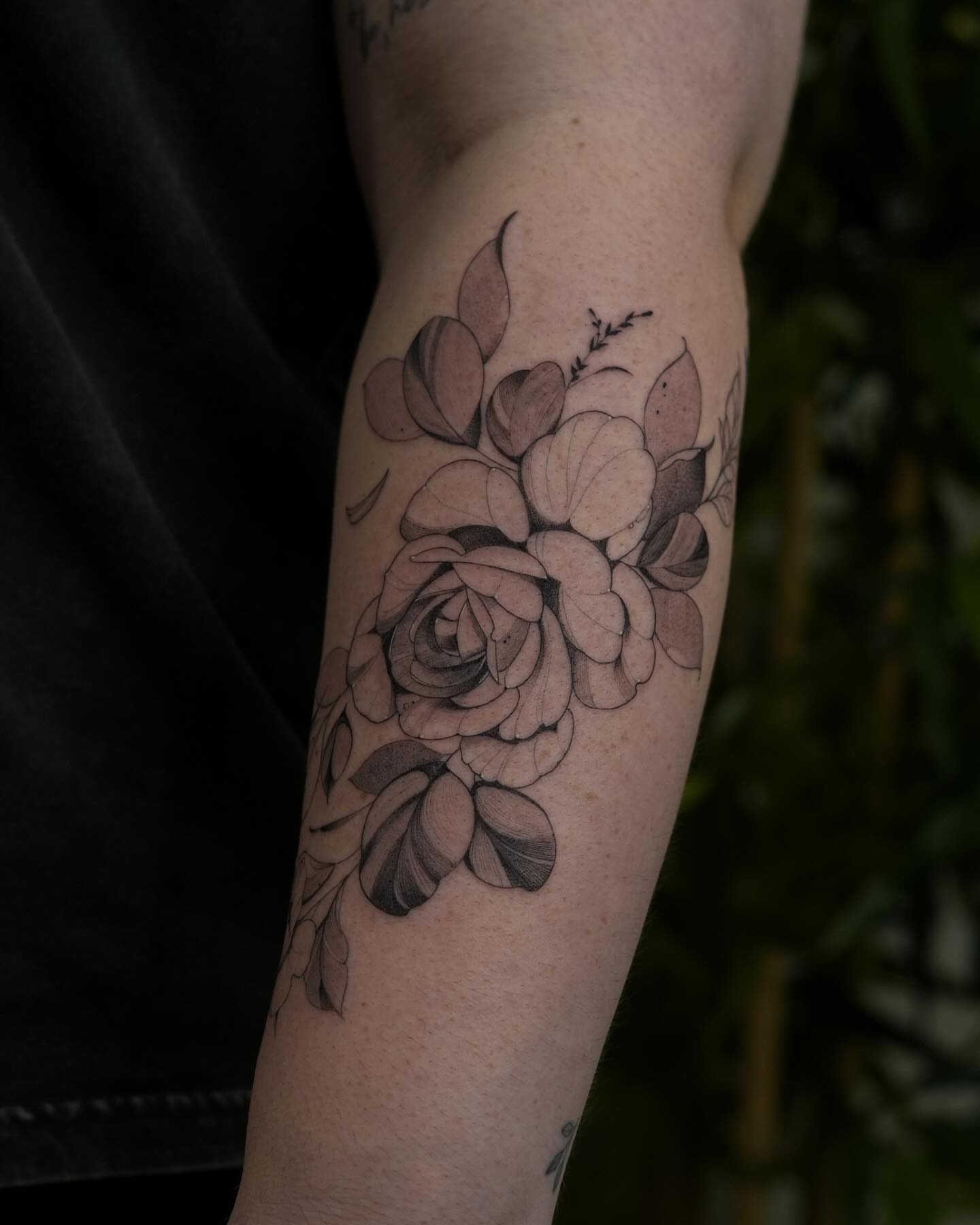 Rose black and grey tattoo on the forearm by Adriano Bassalo